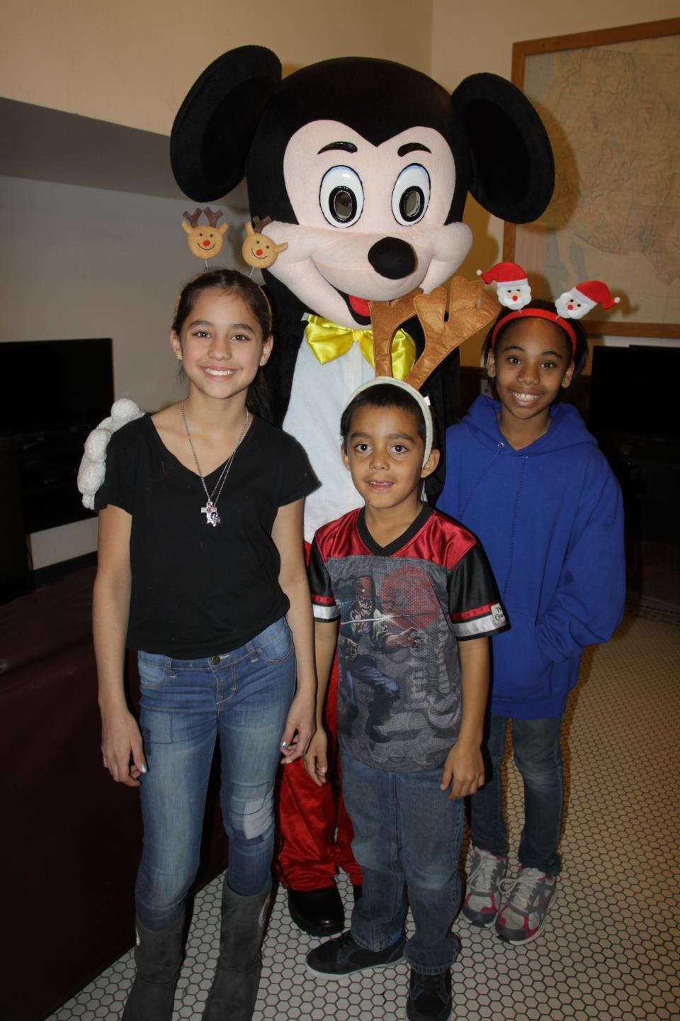 PAL Members pose with Mickey Mouse